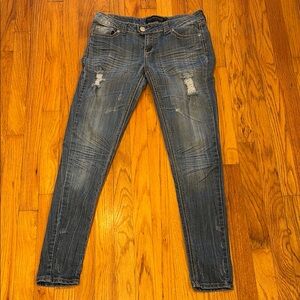 Rue 21 Women's Blue Distressed Jeans, size 7/8 R, button fly , blinged pockets.